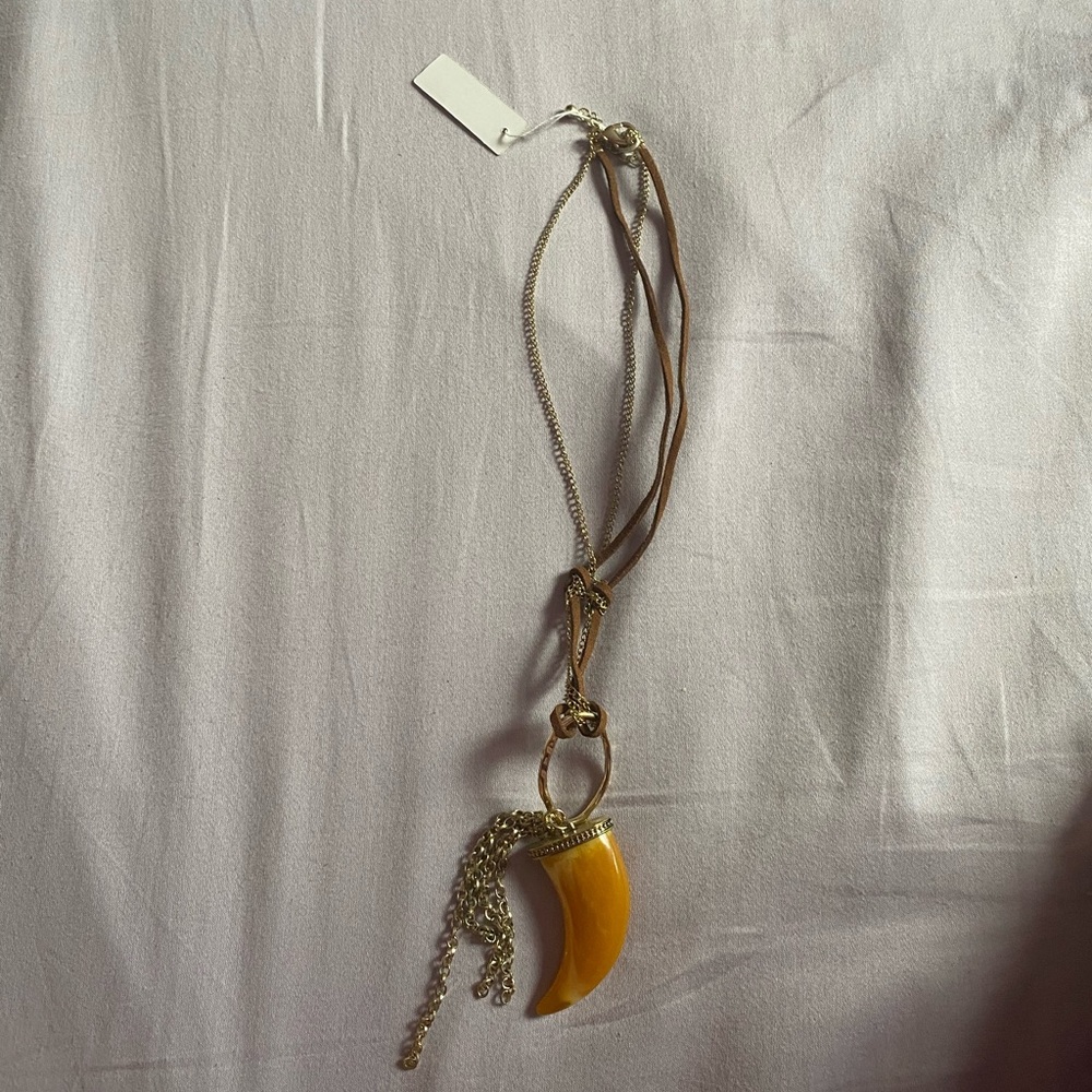 necklace with mustard colored charm